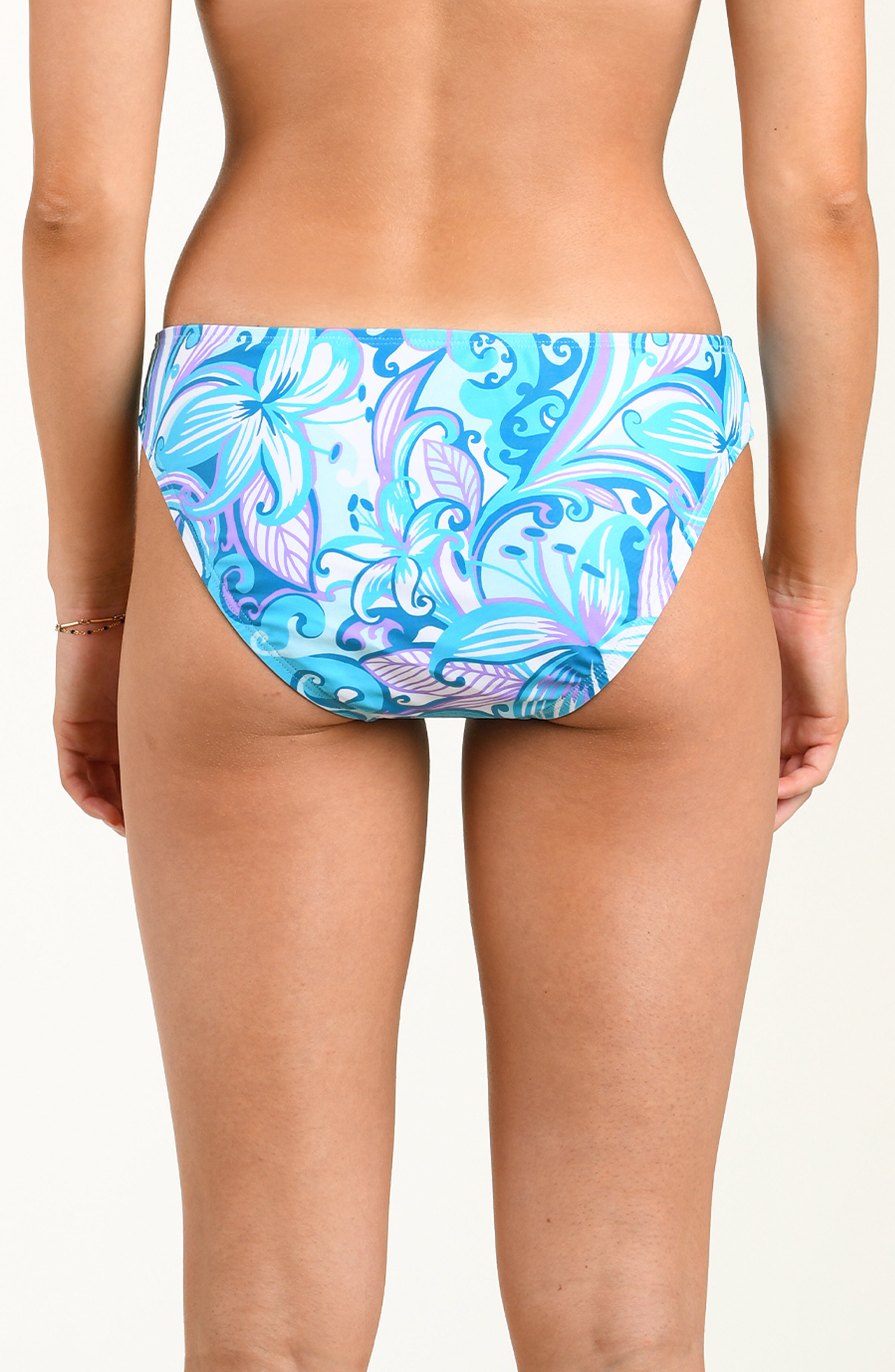 Blue and pink floral bikini bottom on a plain background