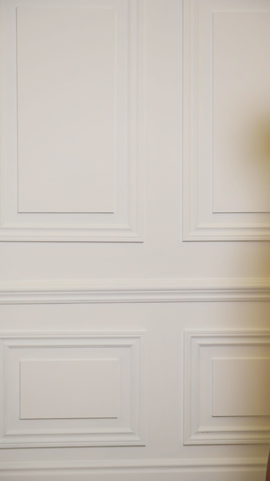 Video of woman wearing a multicolored teal colored one-piece. 