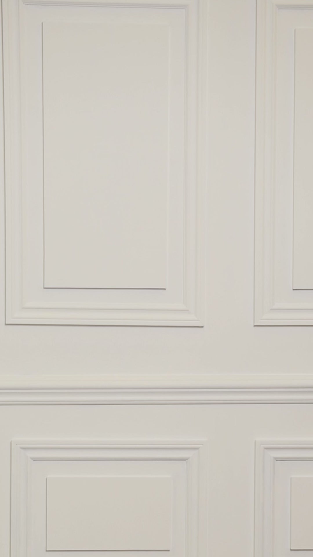 Video of woman wearing a multicolored white and blue tropical one-piece swimsuit.