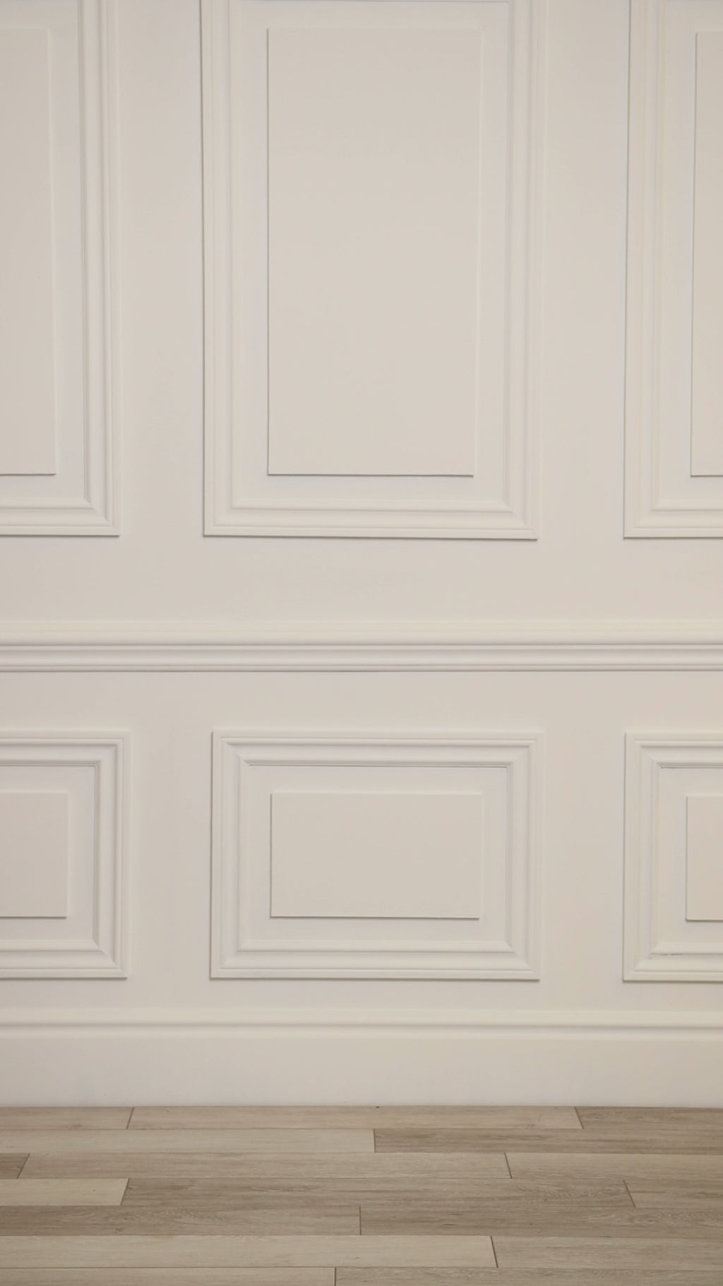 Video of woman wearing a multicolored white and blue tropical sarong one piece.