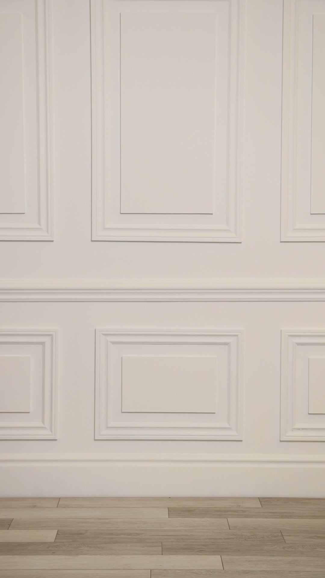 Video of woman wearing a multicolored white and blue tropical sarong one piece.