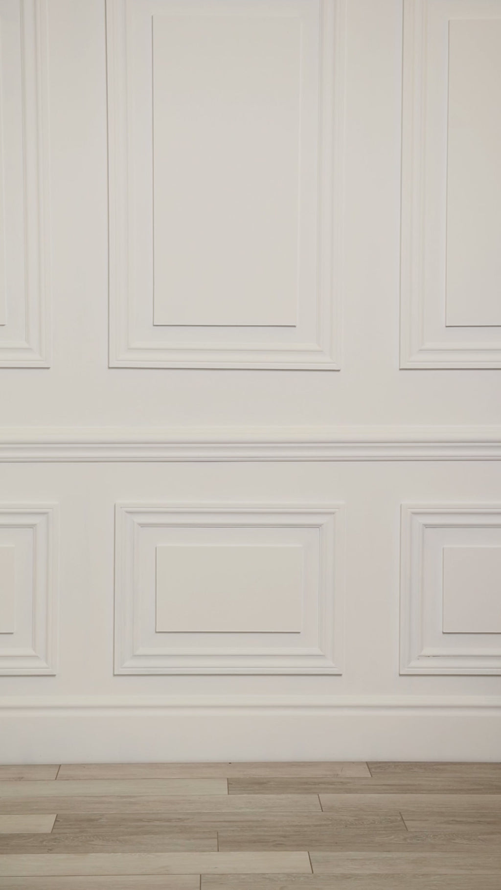 Video of a woman wearing a multicolored (blue) tropical one-piece swim dress. 