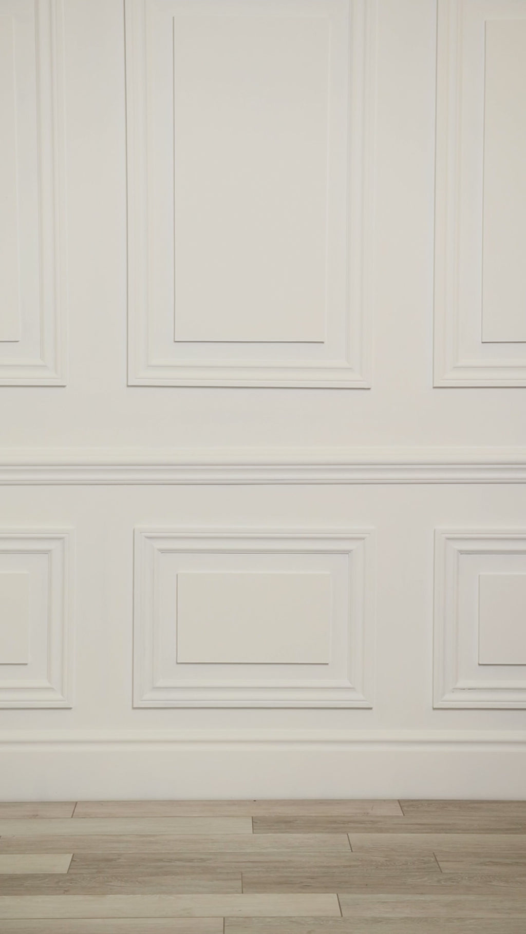 Video of a woman wearing a multicolored (white) tropical one-piece.